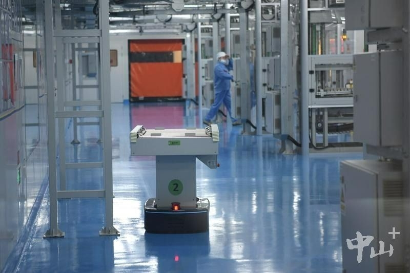 Conveyor robots are widely used in Perfect's production workshops. (File photo by Miao Xiaojian)